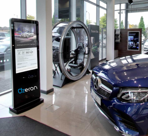 A car is displayed in a Mercedes-Benz showroom, providing a glimpse into the automotive showrooms.