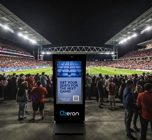 A large screen featuring integrated signage kiosks for ticket sales in the entertainment sector.