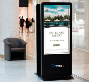 Large-screen kiosk featuring integrated signage for information display in hotels and resorts.